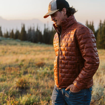 Teton Lederleichte Daunenjacke in Whiskey Braun – Stil und Komfort in einem Schritt