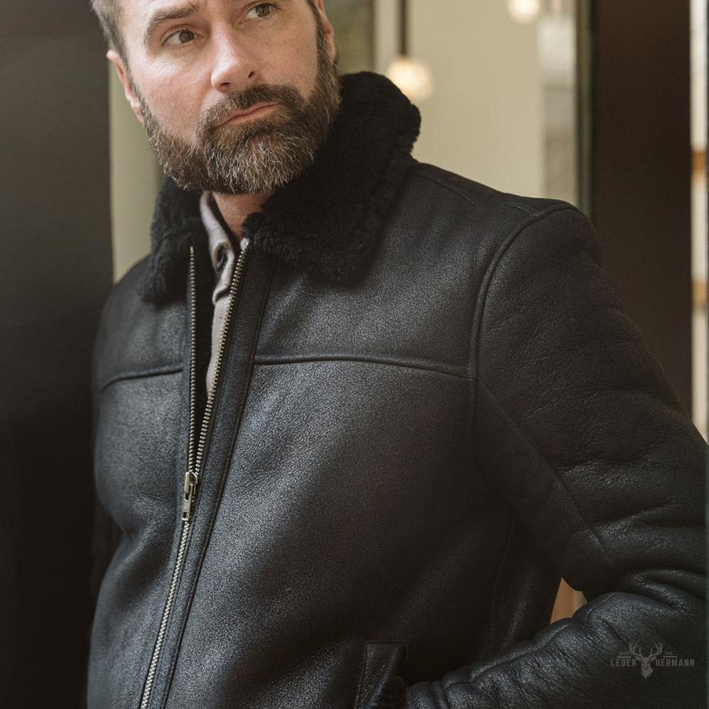 Lederimitat mit Shearling-Stil Bomber Jacke – Schwarze Eleganz für einen trendigen Look