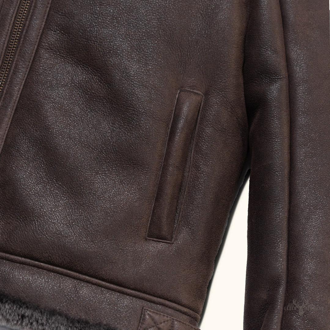 Elegante und warme Braune Espresso Lamm- und Leder-Bomberjacke