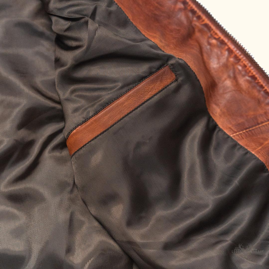 Teton Leder Leichte Daunenweste in Elegant Whiskey Brown